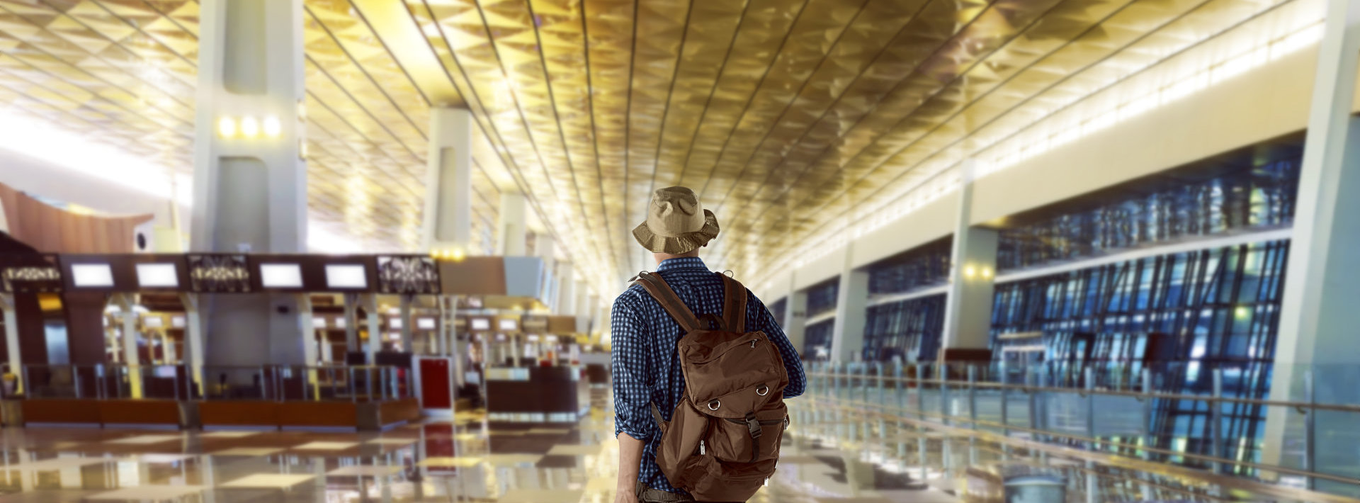 back view of a man with a back pack